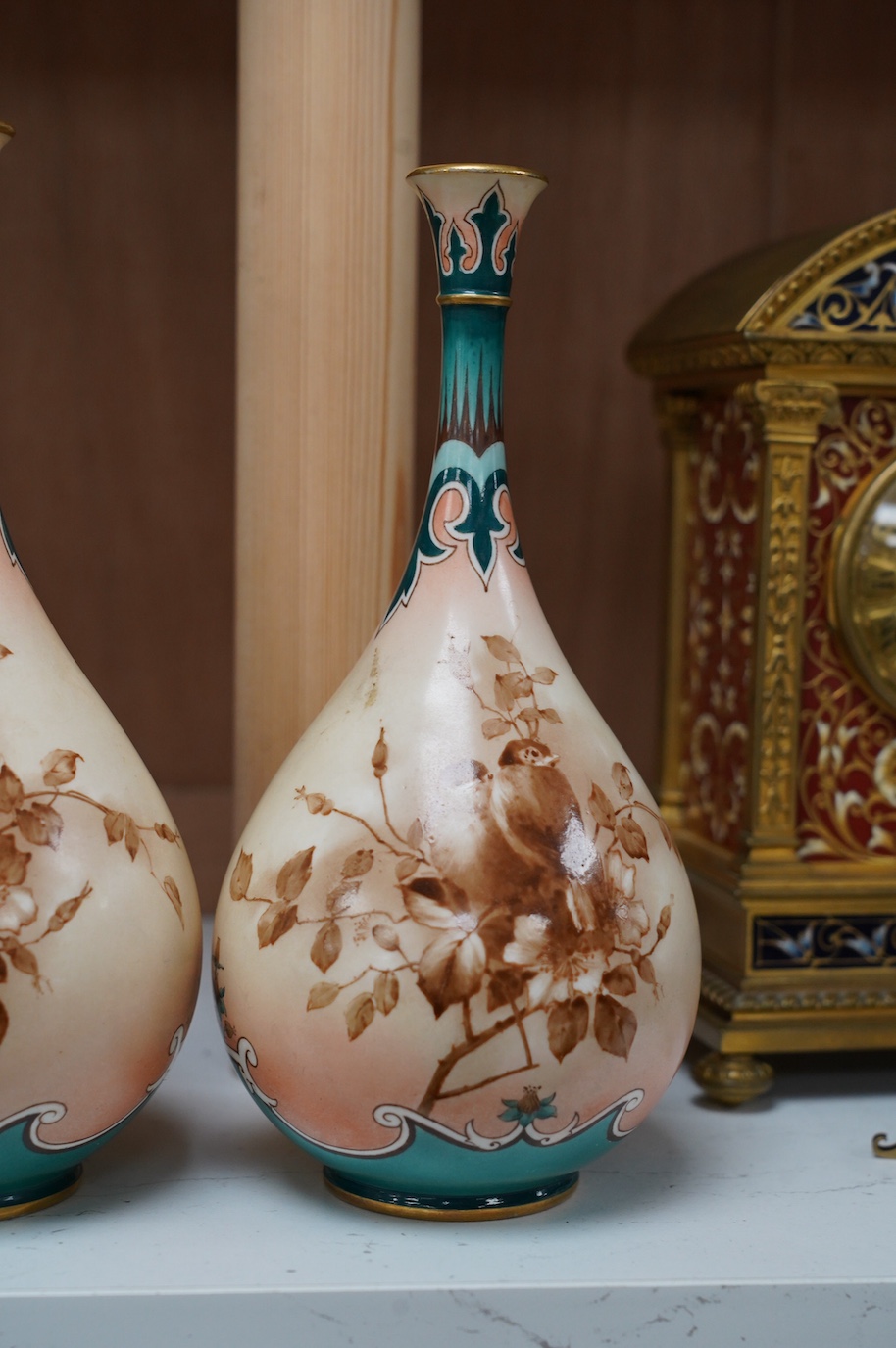 Hadley's Worcester: a pair of vases and two others, tallest 21.5cm. Condition - mostly good, largest vase has two chips to inner upper rim, areas of wear to gilding